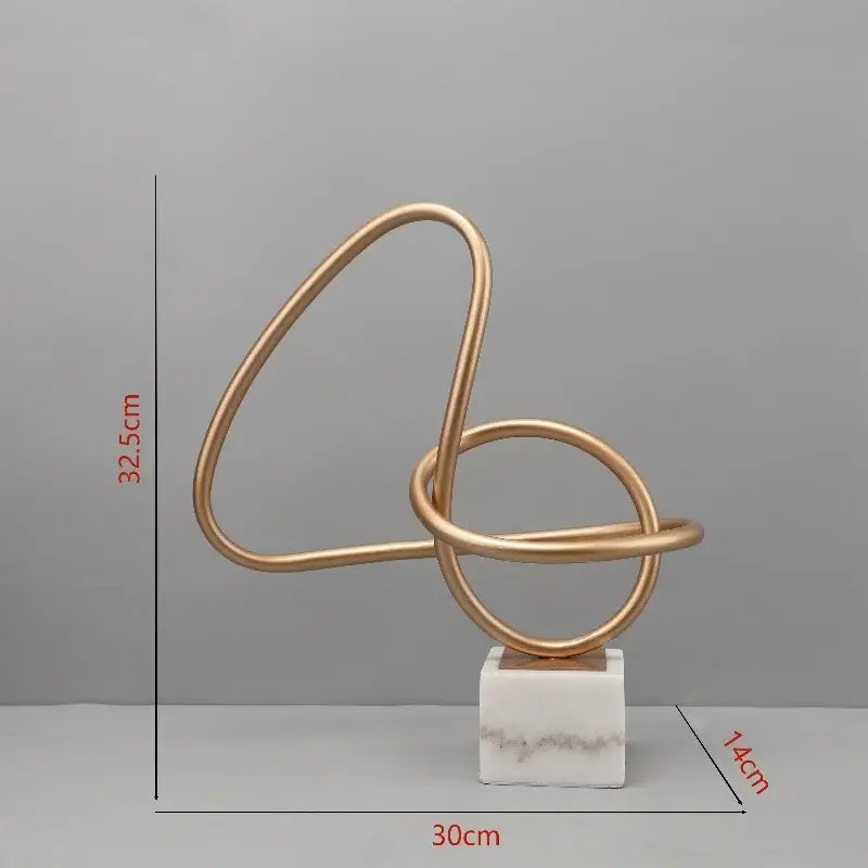 Abstract gold line geometric metal sculptures on marble living room decor