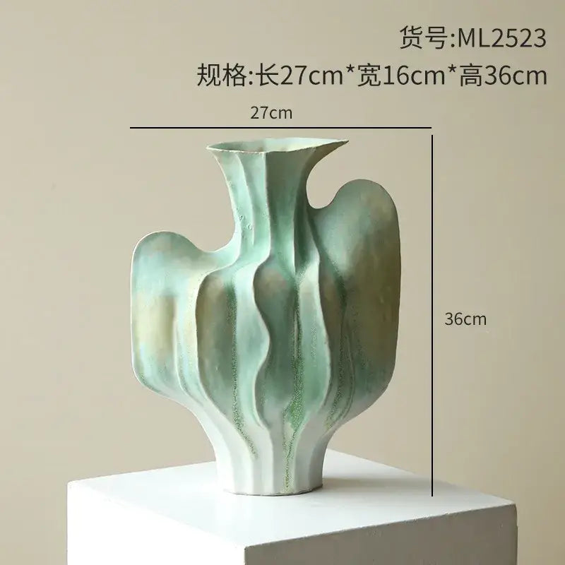 Abstract mint & olive ceramic vase with irregular folds living room