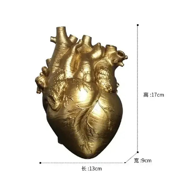 White anatomical heart vase with branches for living room decor