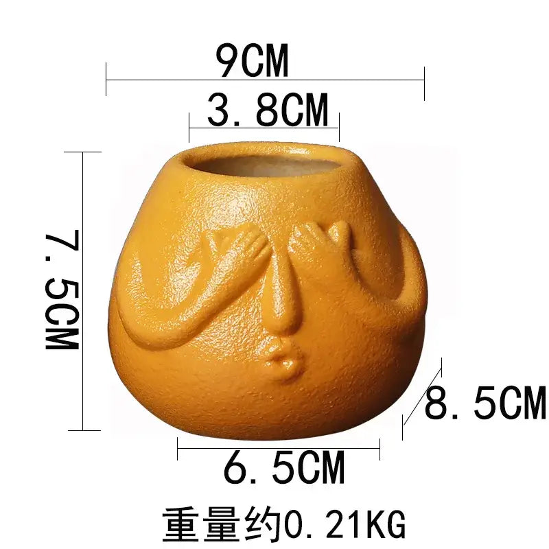 Blue and orange ceramic abstract human face planter living room decor
