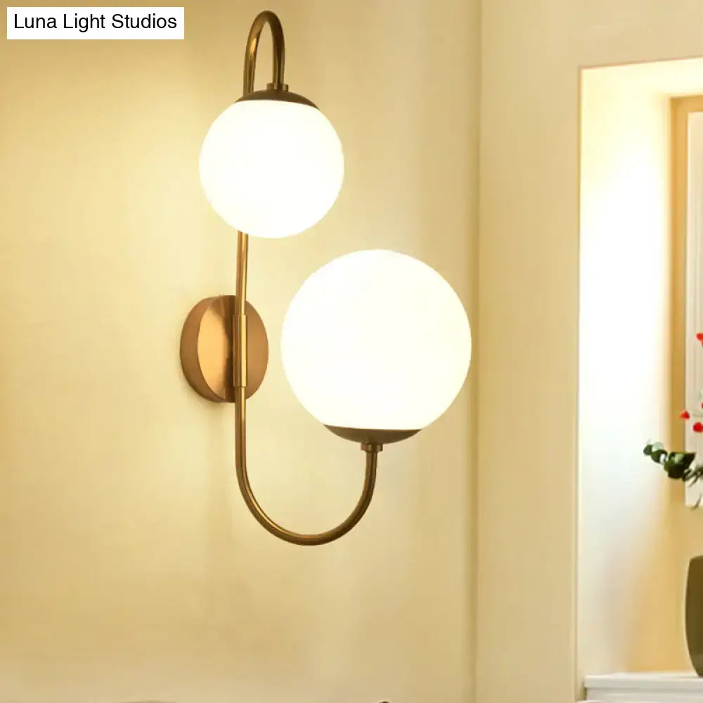 Contemporary gold wall sconce bedroom light with opal glass shade