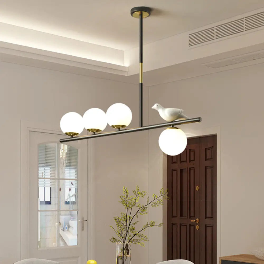 DecorBites™ Contemporary Linear/Branch Dining Room Island Lamp - Cream Glass Ball, 4 Heads, Hanging Pendant with Bird Deco (Black-Gold)