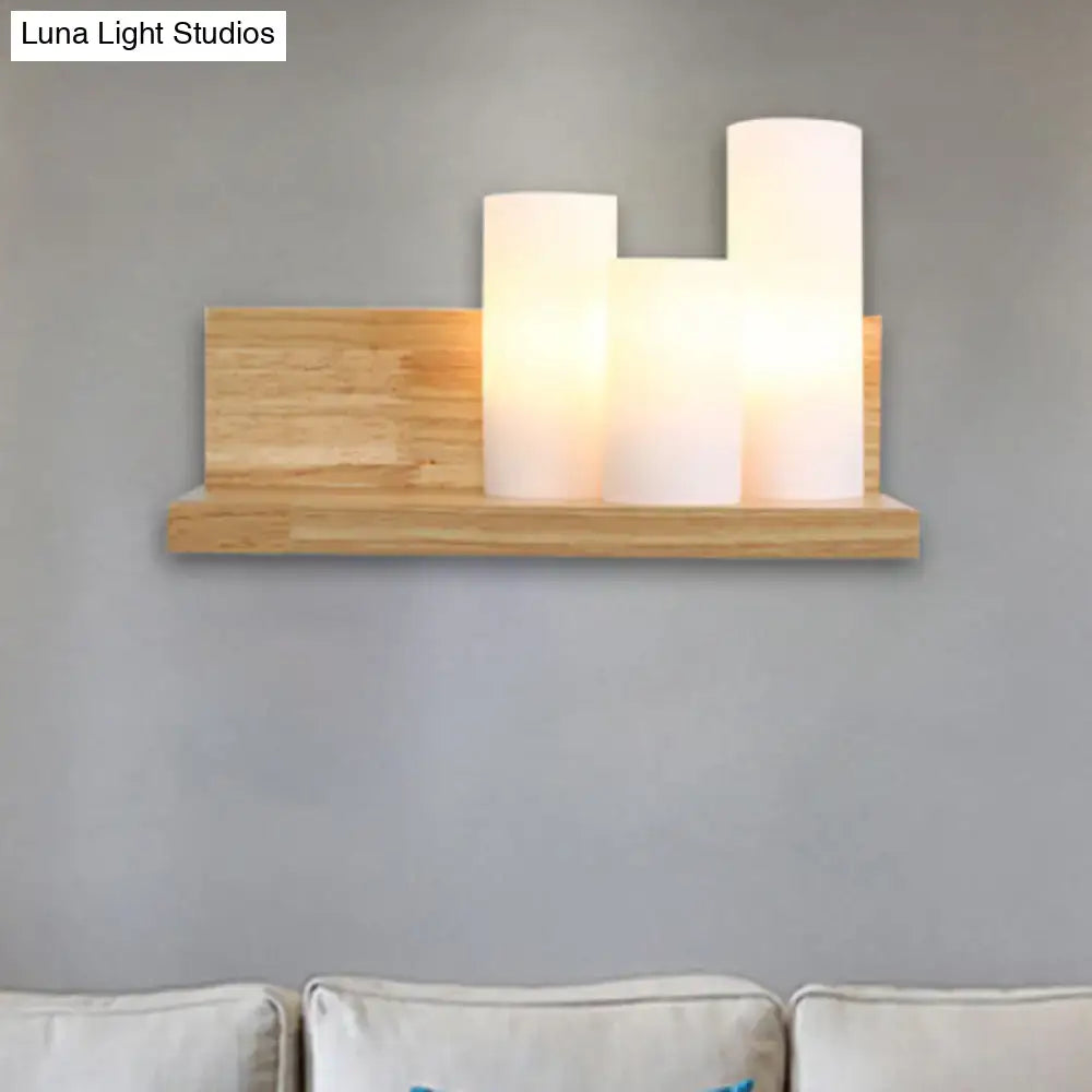 Contemporary tube shade wall lamp with wooden shelf for cloth shop