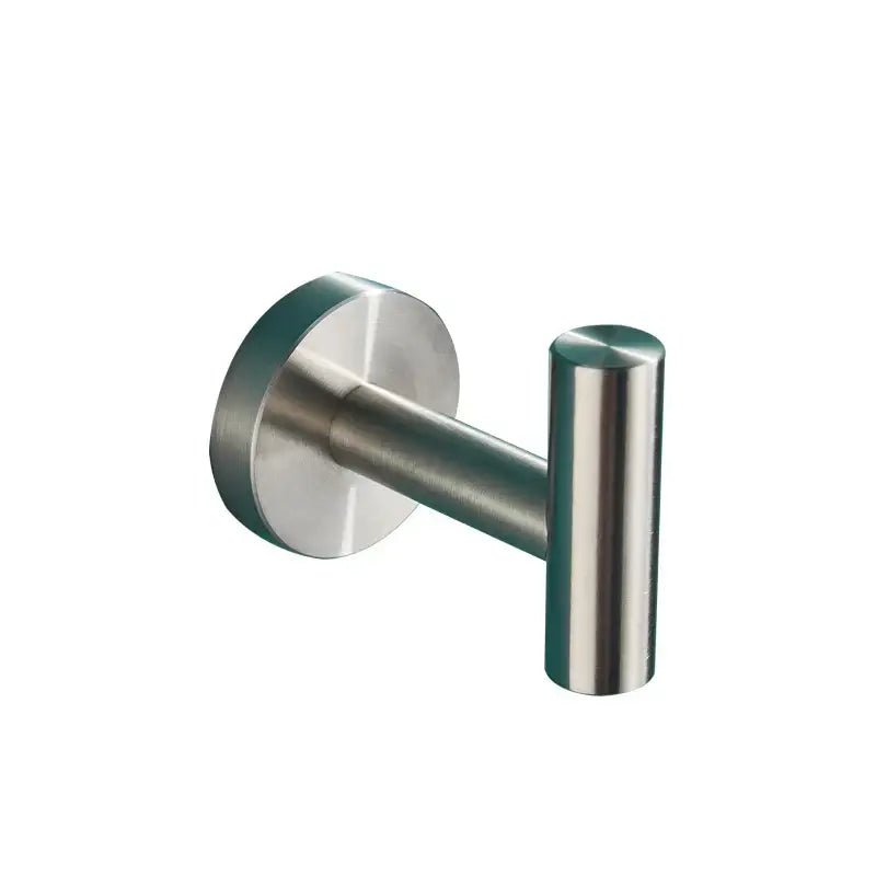Modern brass bathroom hardware set with cylindrical towel rack
