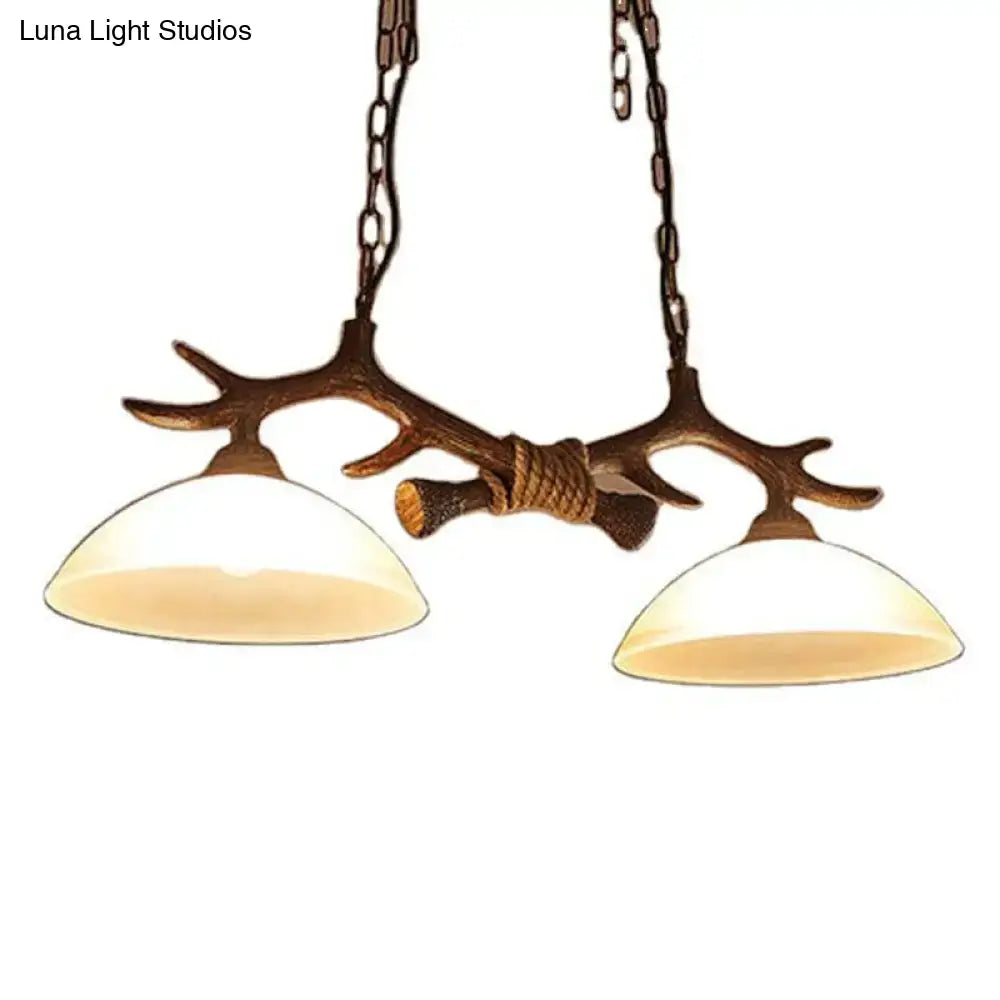 Rustic antler decor dark coffee island light beige glass dining room