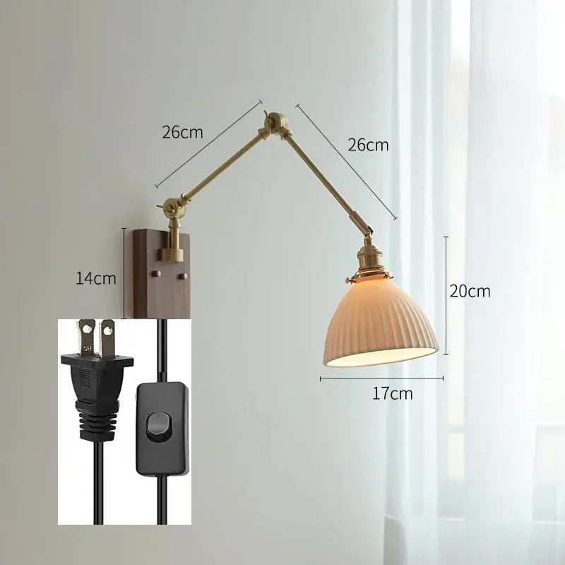 copper swing arm wall lamp with glass shade for bedroom