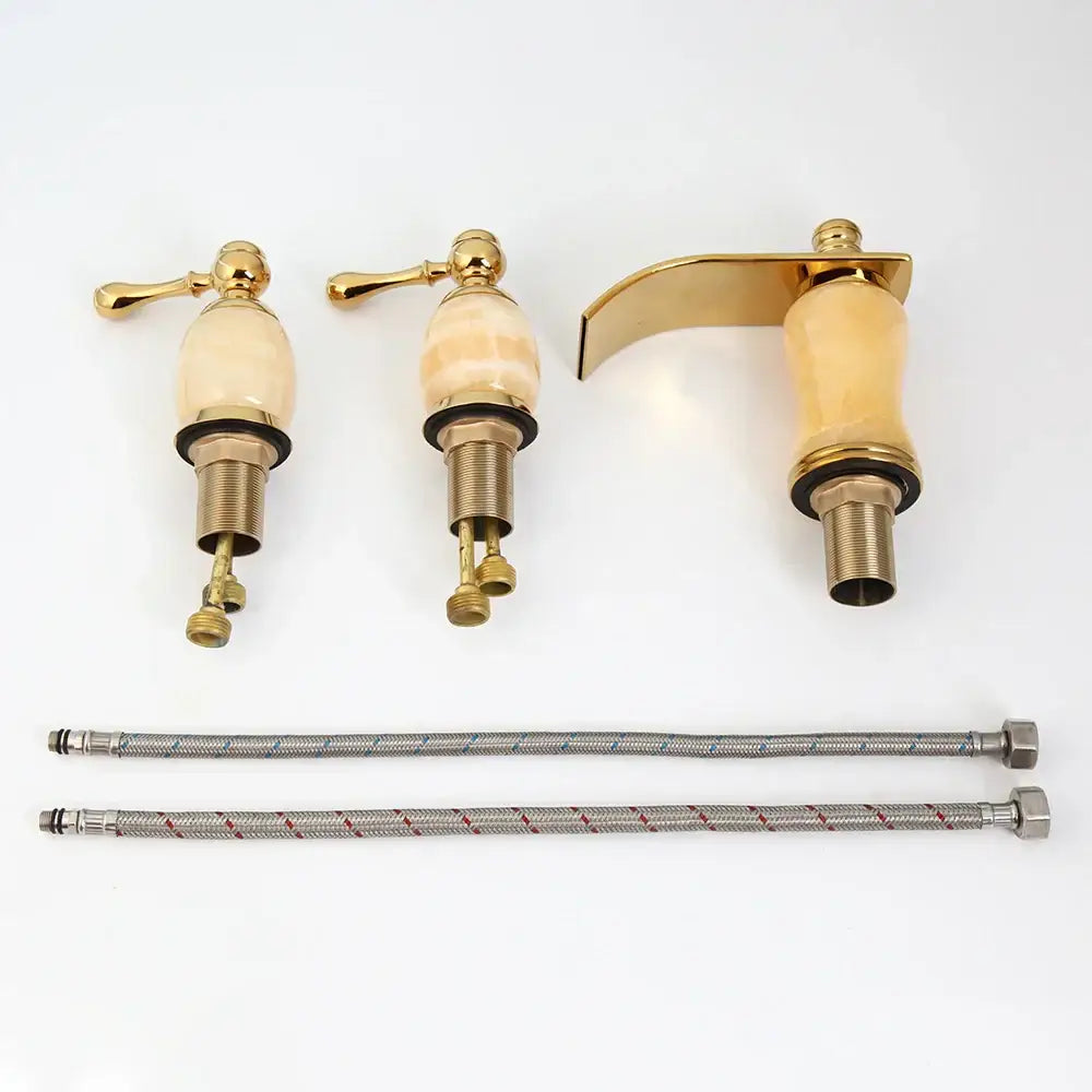 golden plated waterfall bathtub faucet with marble handles