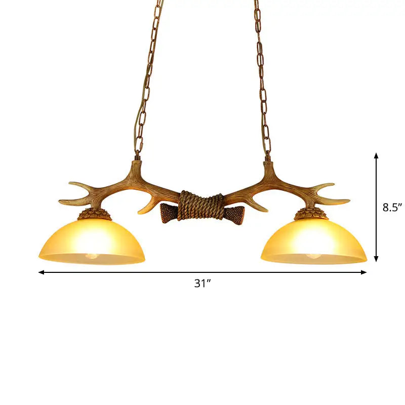 Rural antler and milk glass bowl pendant light dining room