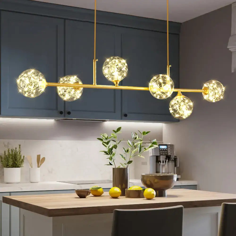 Minimalist brass led fairy light clear glass sphere dining room pendant