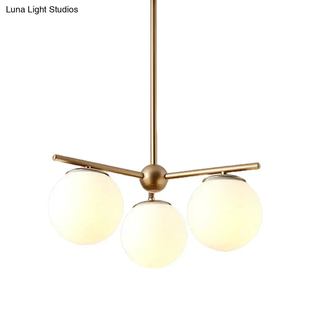 Modern gold 3-light white frosted glass globe chandelier bedroom