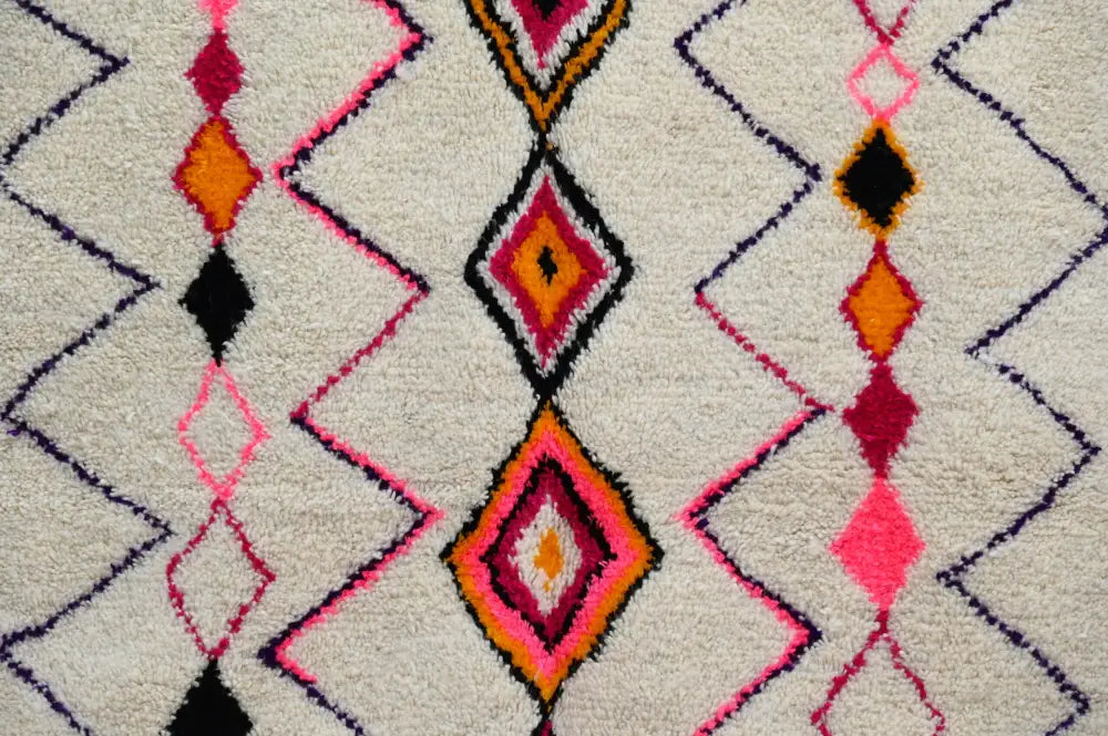 Handmade beige azilal rug with geometric patterns for living room
