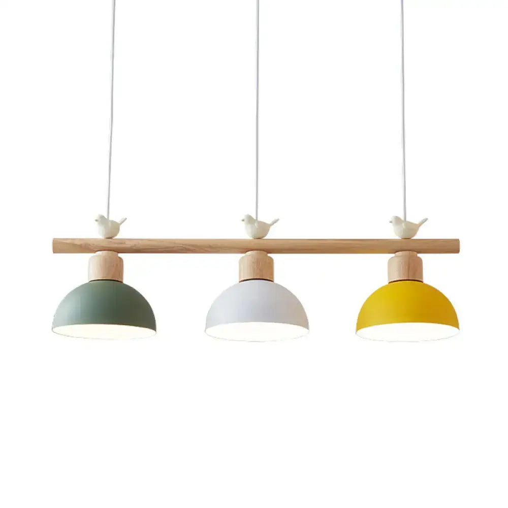 Minimalist wood and white bird hanging island light dining room