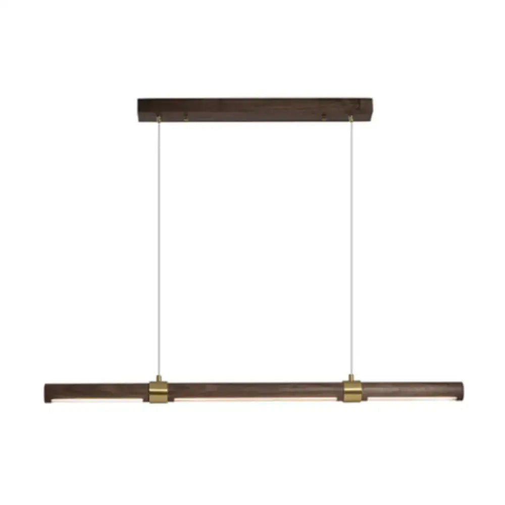 Modern wood island pendant light with brass accents dining room