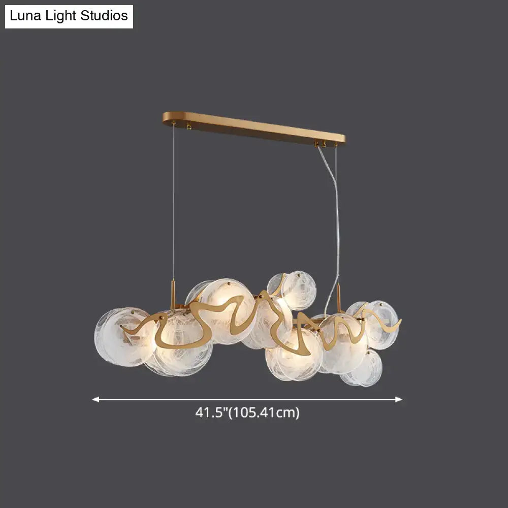 Postmodern gold and glass circle pendant light for dining room