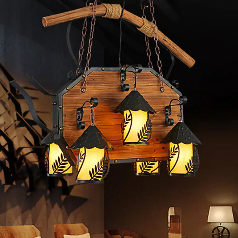 Rustic wood and black teapot light fixture clear glass dining room