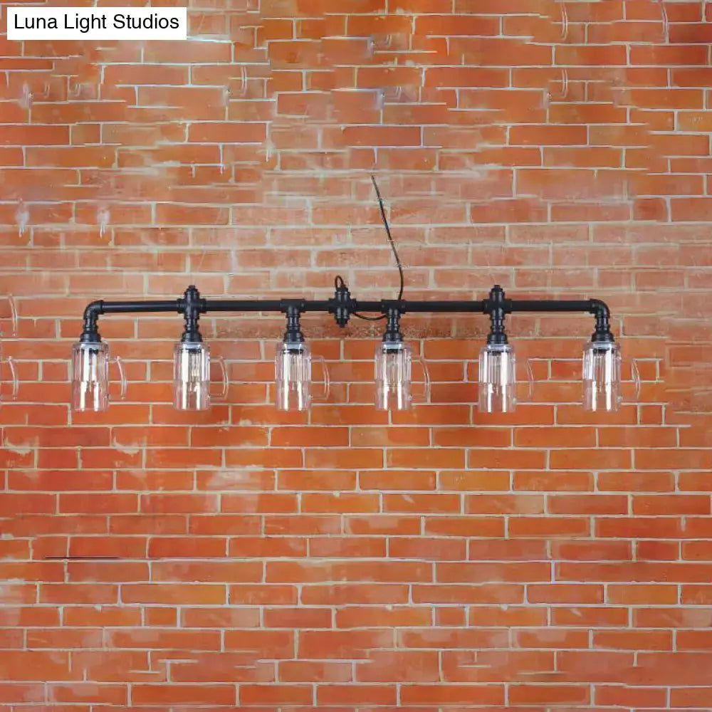 Industrial black pipe island light with beer mug glass shade dining room