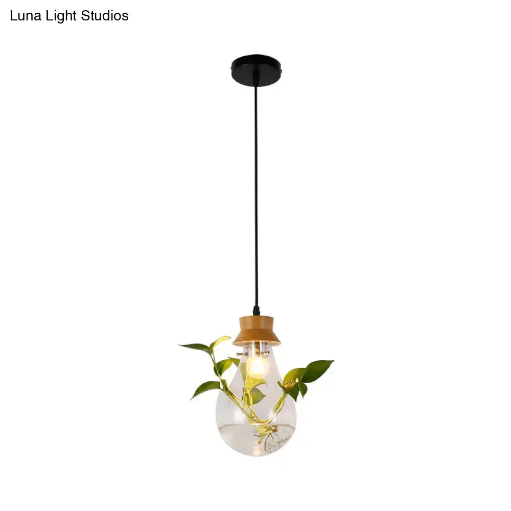 Industrial glass and wood pendant light kit with exposed bulb dining room