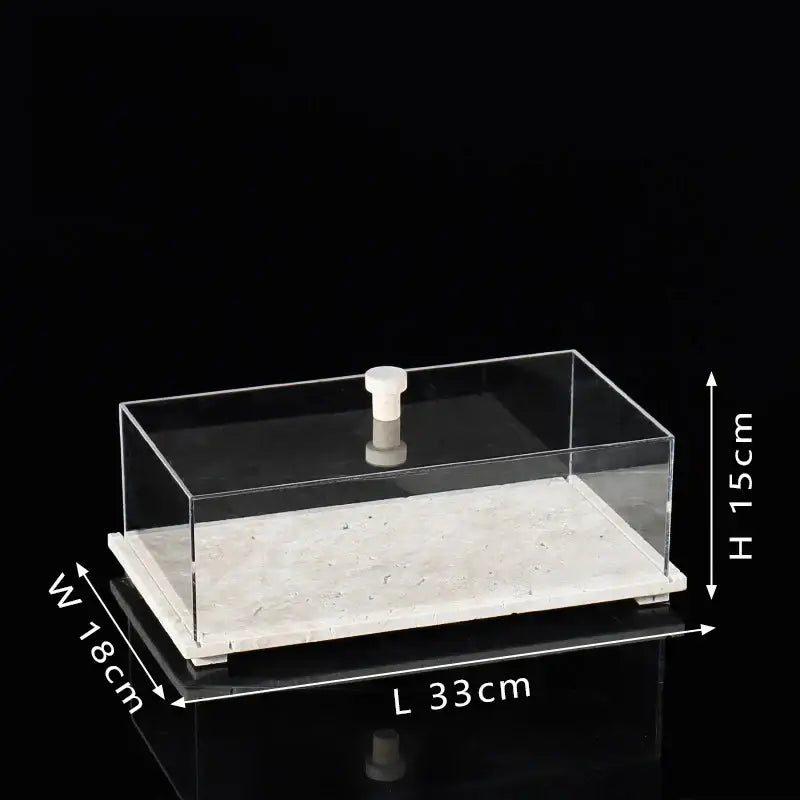 Modern acrylic display case with travertine base for dining room