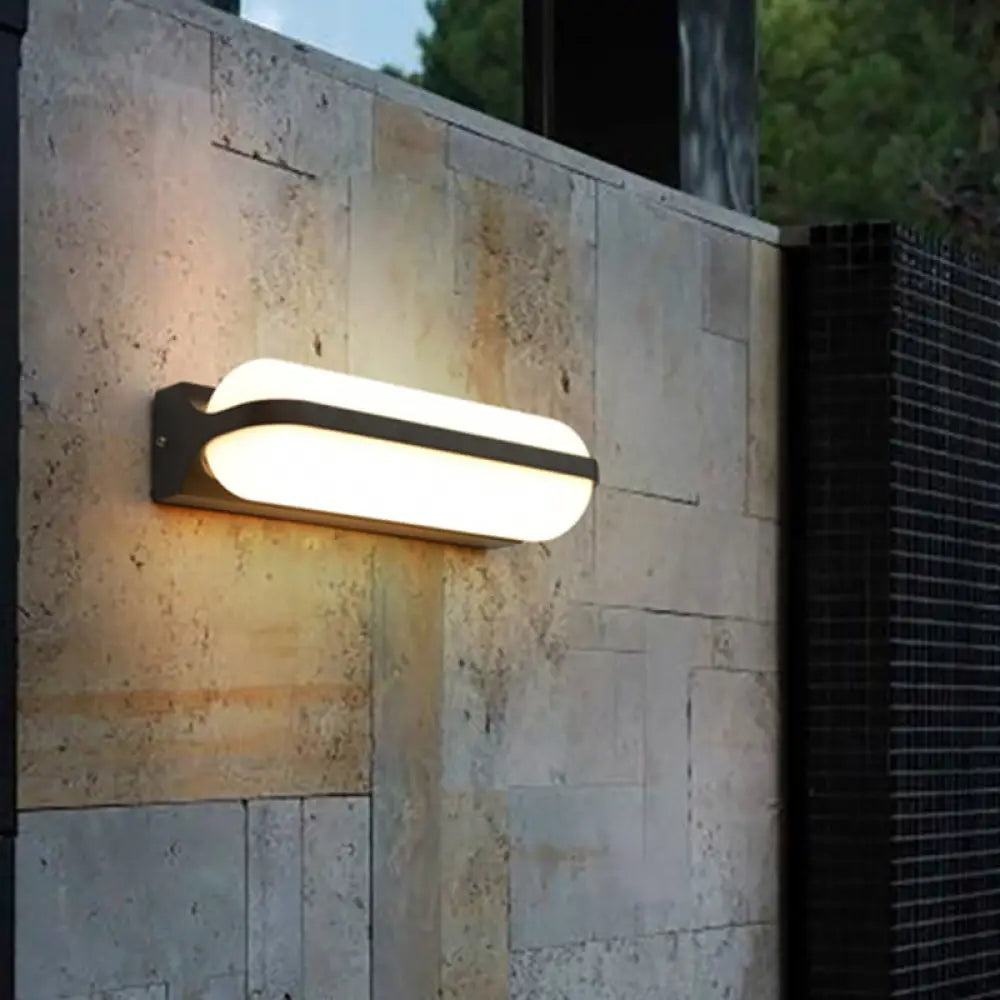 DecorBites™ Modern Black Acrylic Wall Sconce with Flush Capsule Design and Half-Bulb Mounting
