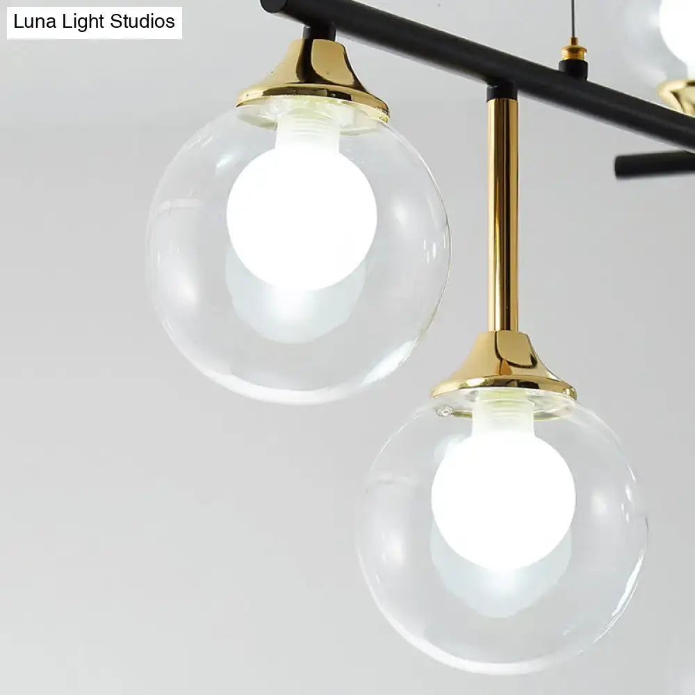 Modern black and gold globe pendant light for dining room