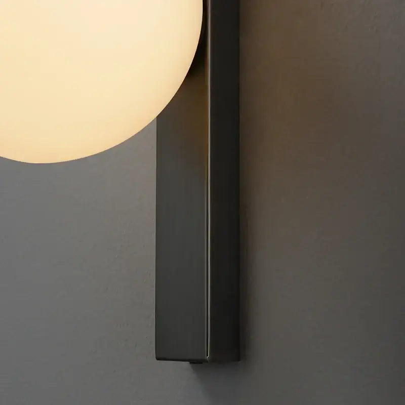 Modern black copper wall sconce – bedroom frosted glass globe light
