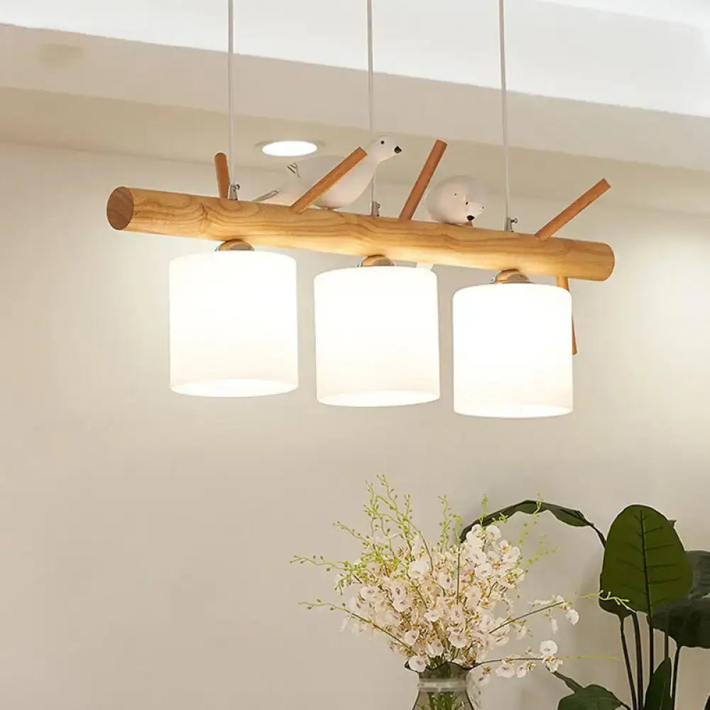 Modern black island pendant light with birds for dining room