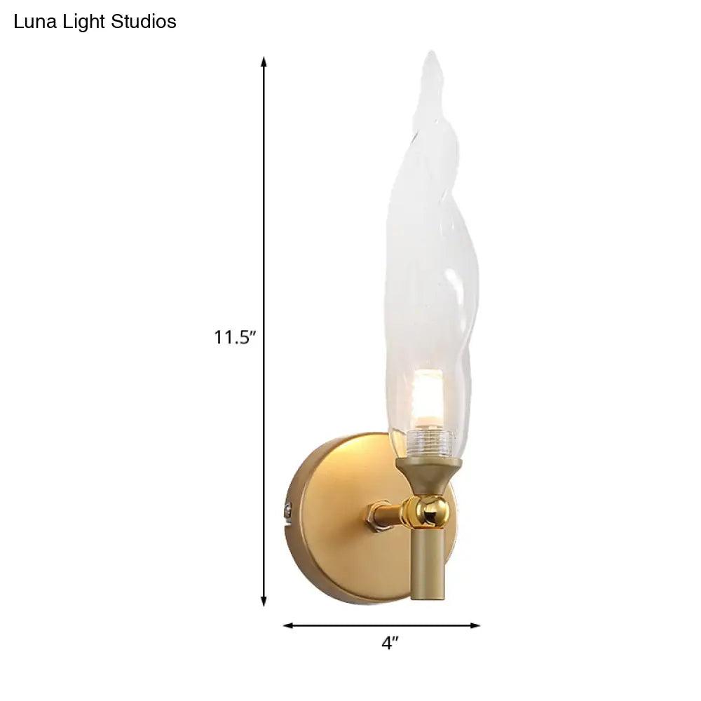 DecorBites™ Modern Brass Torch Sconce: LED Wall Mount Lamp with Clear Glass - Bedside Lighting