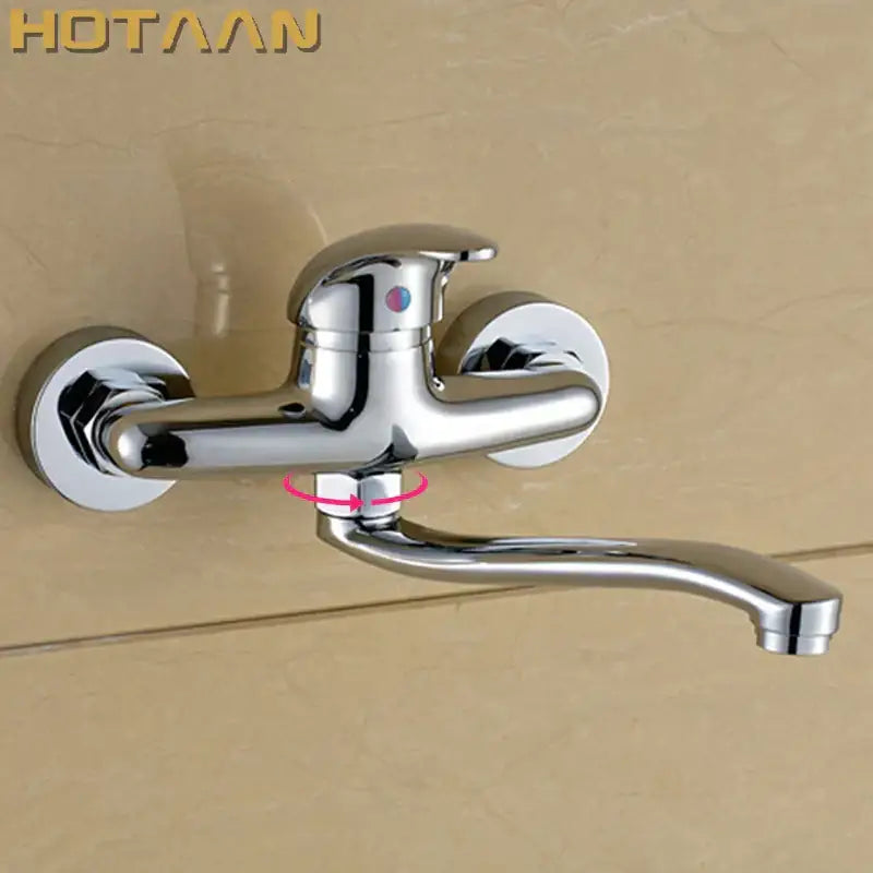 Modern chrome wall mounted kitchen tap with curved spout