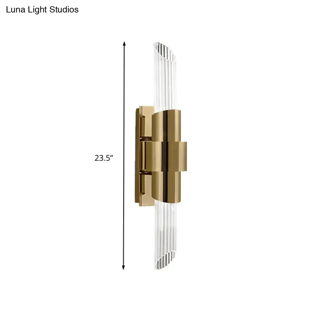 Modern gold wall lamp with prismatic crystal shade for bedroom