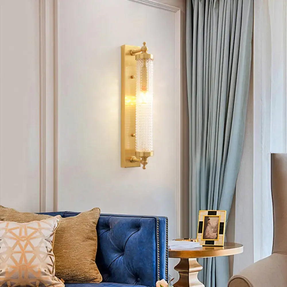 Modern gold wall light fixture with frosted glass for living room
