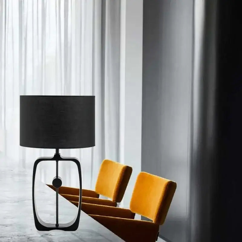 Modern matte black metal table lamp with fabric shade for living room