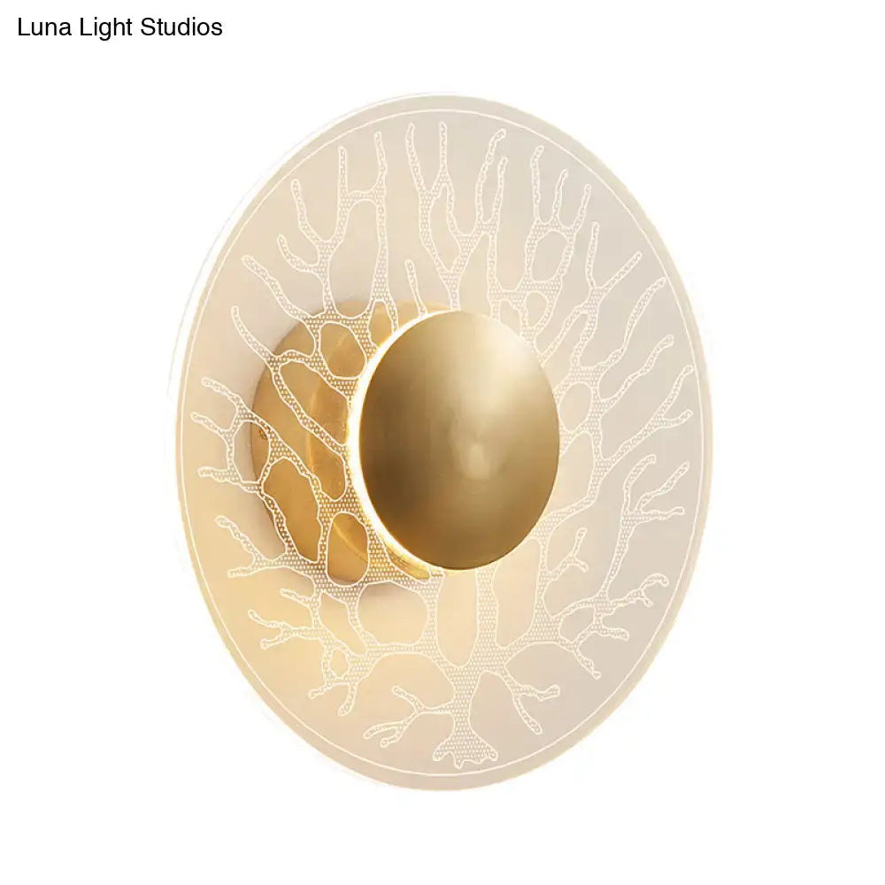 Modernist brass and clear glass wall light fixture living room