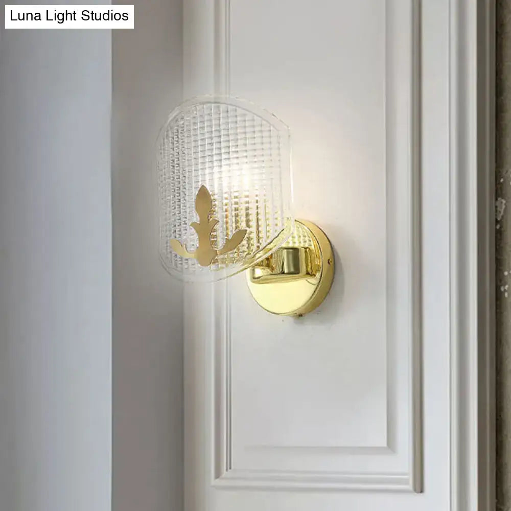 Post-modern gold wall sconce with clear lattice glass bedroom light