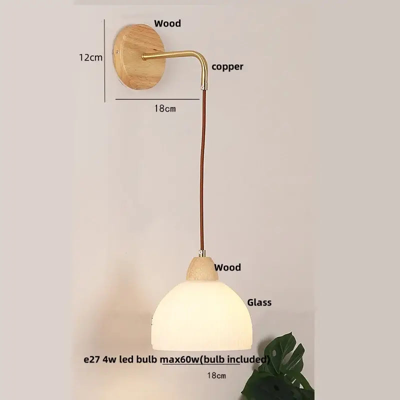 Rustic wood and brass wall light with clear glass pull chain switch