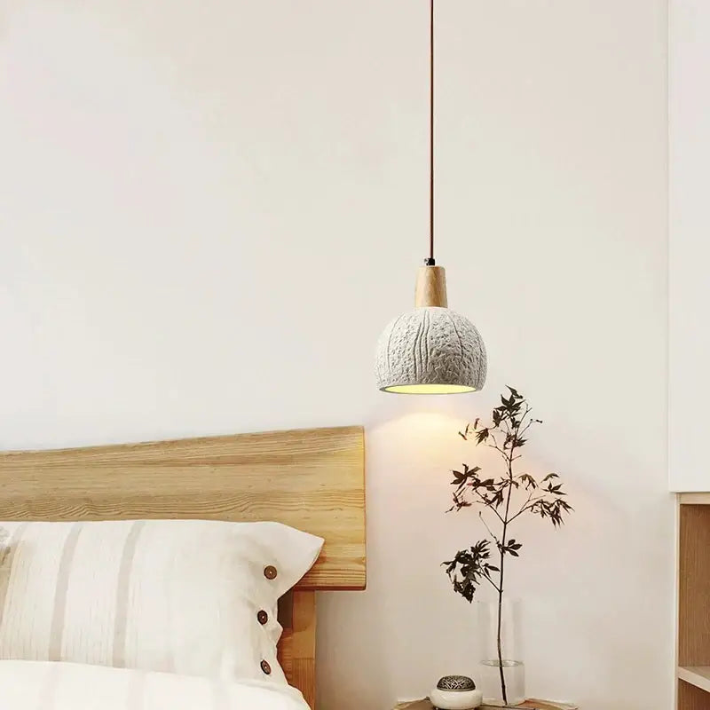 Textured gray cement and wood pendant lamp for dining room