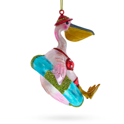 Pelican on Inflatable Ring Glass Christmas Ornament