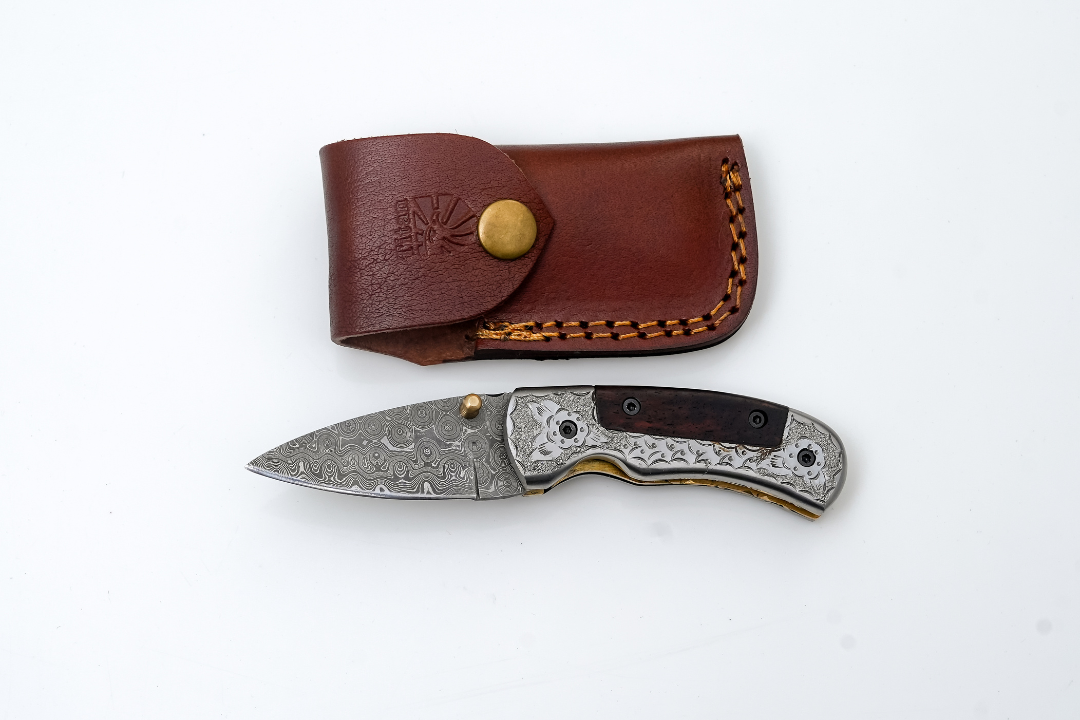 Hand-Forged Damascus Folding Knife | Engraved Bolster, Dark Wood Handle & Intricate Spine File Work TF-074
