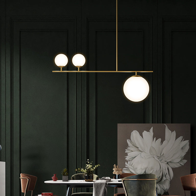 DecorBites™ Minimalistic Brass Ball Pendant Light: Opal Glass Island Lighting for Dining Room (3-Light)