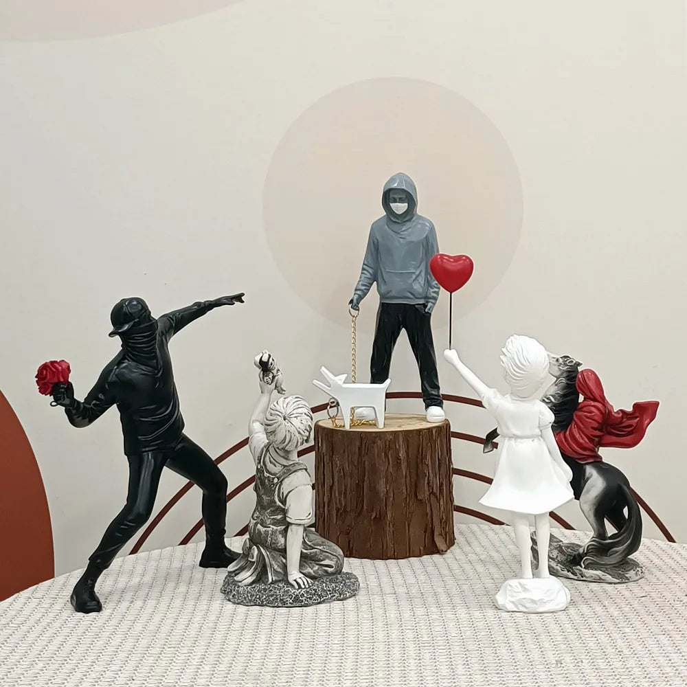 DecorBites™ Banksy Sculpture Collection: Flower Thrower & Balloon Girl Figurines for Home & Office