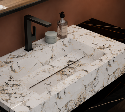 Marble countertop with sink, faucet, and toiletries