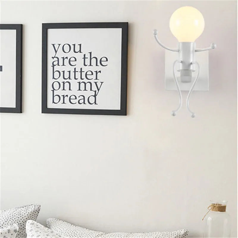 DecorBites™ Cartoon Doll Wall Sconce: Modern Iron Art Light for Kids Room