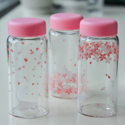 DecorBites™ Kawaii Sakura Glass Water Bottle 310ml Cute Cartoon Animal Design