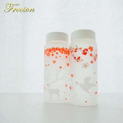 DecorBites™ 430ml Swallow Frost Glass Water Bottle with Sleeve, Elk Design