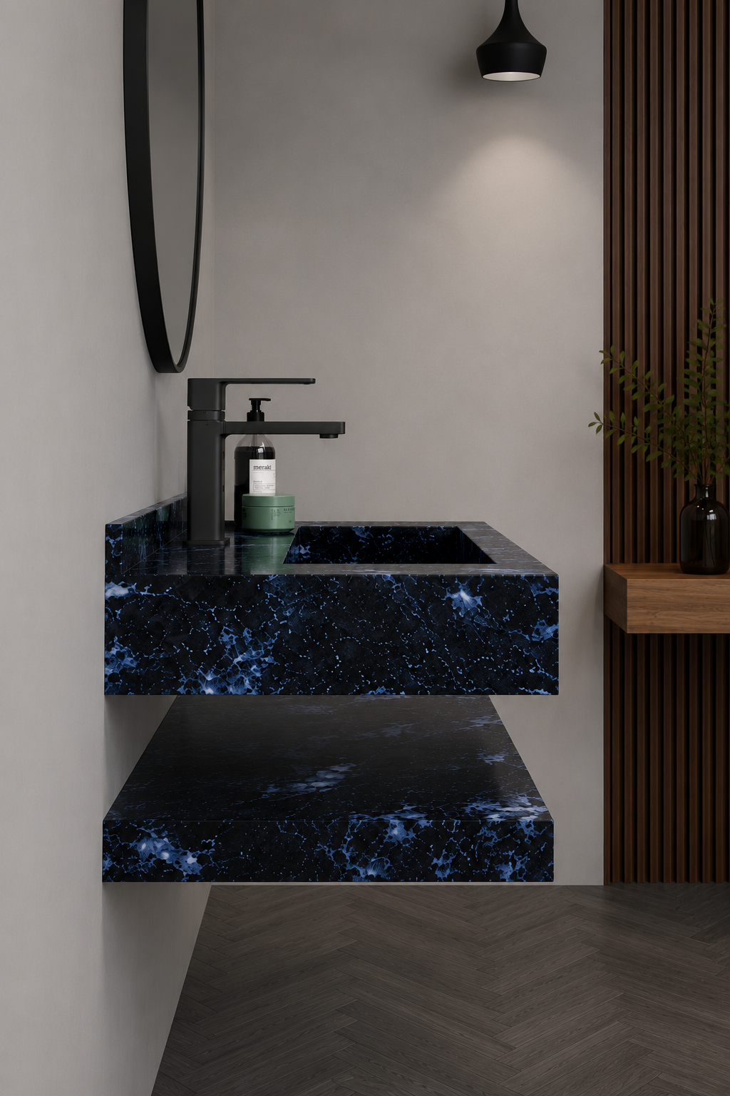 Bathroom vanity with blue marble countertop and black faucet.