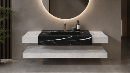 Modern bathroom vanity with black marble countertop and concrete shelves.