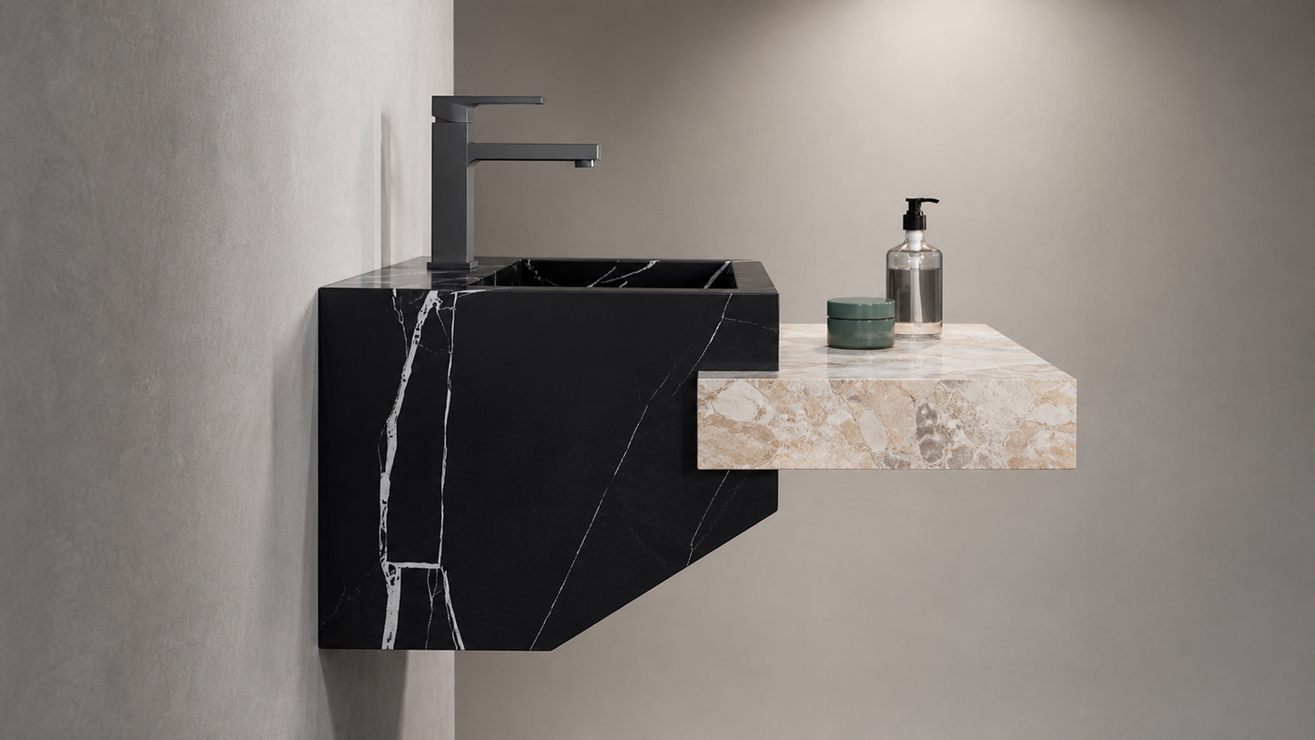 Modern bathroom setup with black marble sink and beige countertop.
