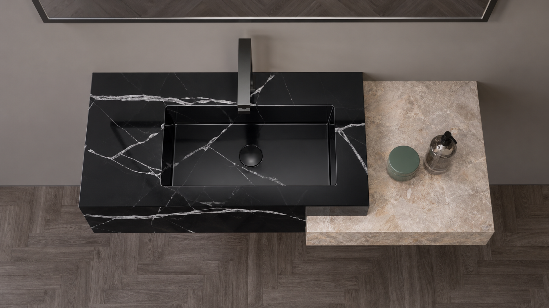 Black marble sink on a stone countertop with a neutral background