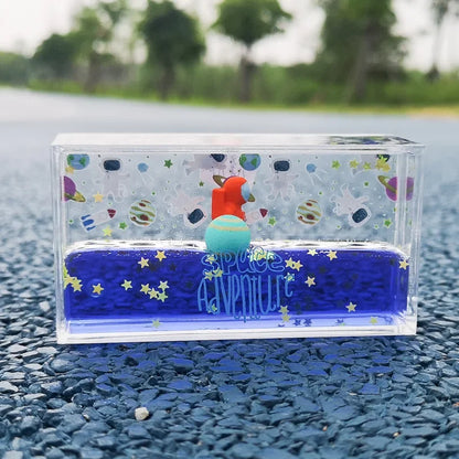 DecorBites™ Astronaut Drift Keychain: Creative Liquid Hourglass Stress Relief Toy & Home Decor