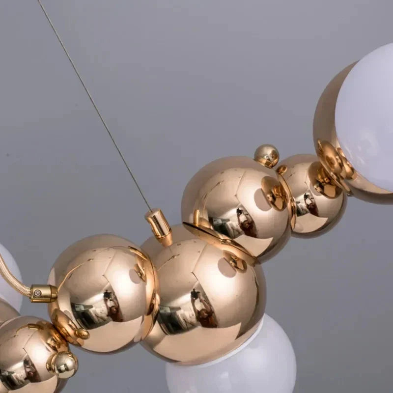 DecorBites™ Caterpillar Metal Ball Chandelier: Modern Creative Long Bar Pendant Light for Kitchen Dining Room