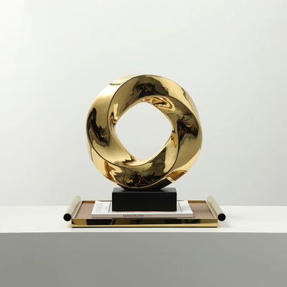 DecorBites™ Geometric Gold Hollowed Twisted Circles Figurines Home Decor